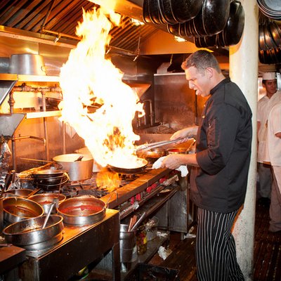 Chris Nirschel, From New York Catering Service, Showcases His Culinary Expertise By Harnessing The Power Of Fire.