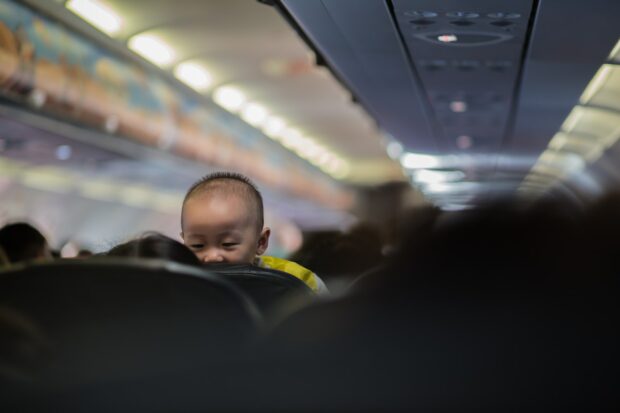 Baby In Passenger Airplane