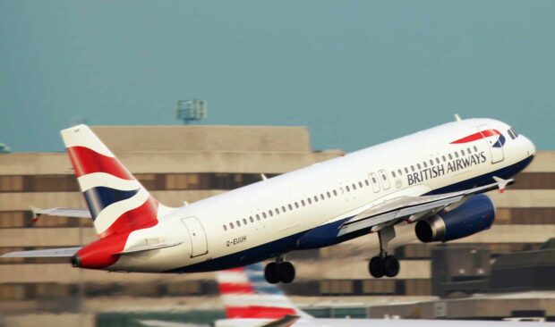 British Airways Airplane Taking Off From An Airport Runway