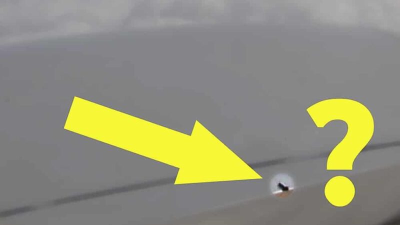 Why Airplane Windows Have that Little Hole in the Bottom