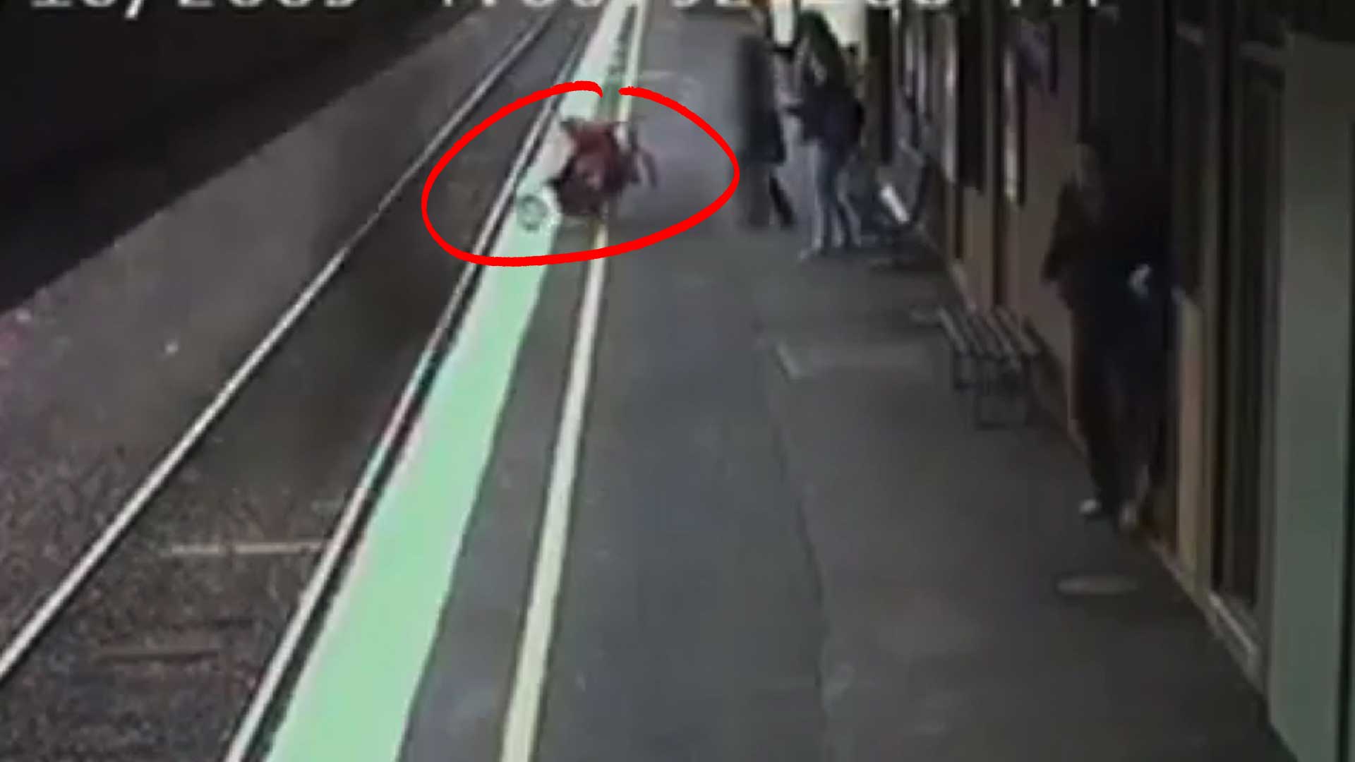 OMG - Baby Stroller Rolls into Path of Oncoming Train