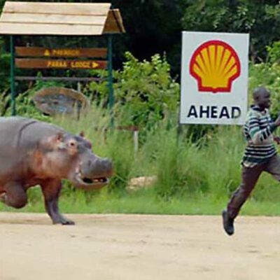 Man Running Away From A Hippo