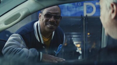 Eddie Murphy, one of the original stars of Beverly Hills Cop, sits in a car, gazing out the window thinking about the sequel Beverly Hills Cop 4: Axel F