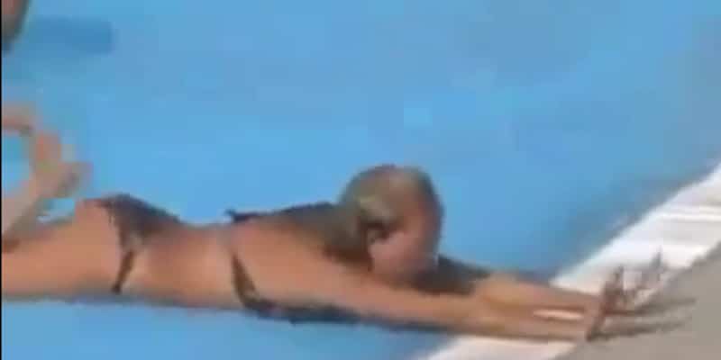 Bikini Blonde Shows Off Her Strange Poolside Dance Moves