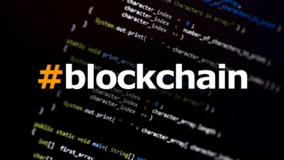 blockchain logo over a code background