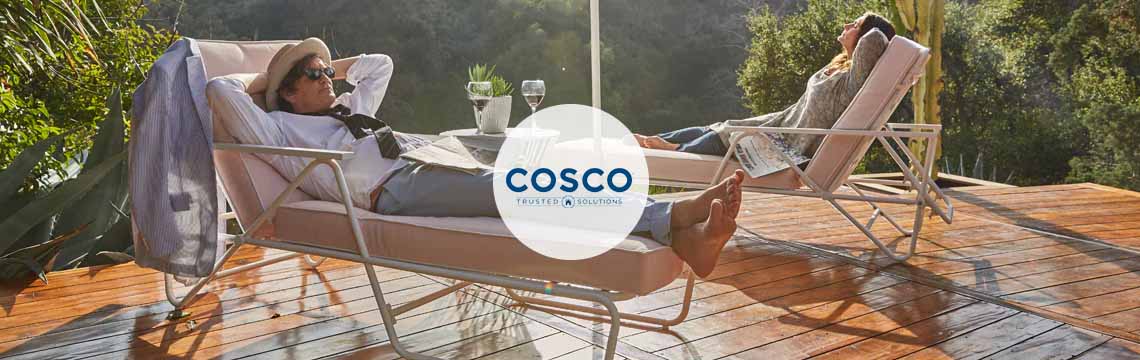 Cosco - Two People Enjoying A Moment Of Relaxation In A Lounge Chair On A Deck.