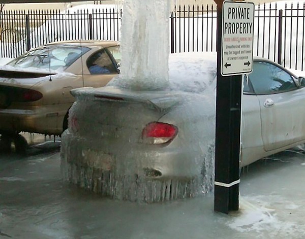Car Trapped Under Ice In Parking Garage