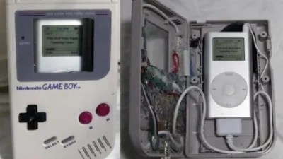 A modified Nintendo Game Boy on the left and an open GameBoy housing displaying an iPod case on the right.