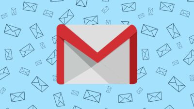 Illustration Of A Large Gmail Icon In The Center Surrounded By Smaller Email Icons On A Blue Background.