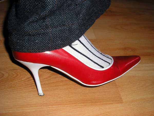 Helen Lawrence - A Celebrity Wearing Red And White High Heeled Shoes.