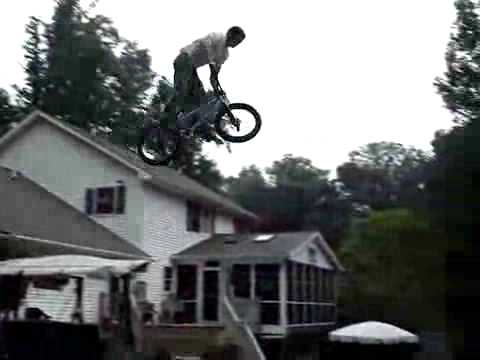 Insane BMX Jump Over A Fence and Into A Swimming Pool