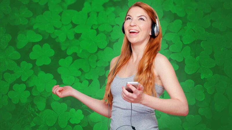 Happy Woman Listening To Irish Music