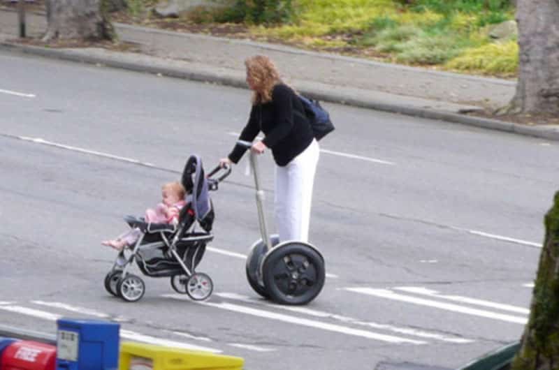 Lazy Segway Mom Dangerously Pushes Baby Stroller