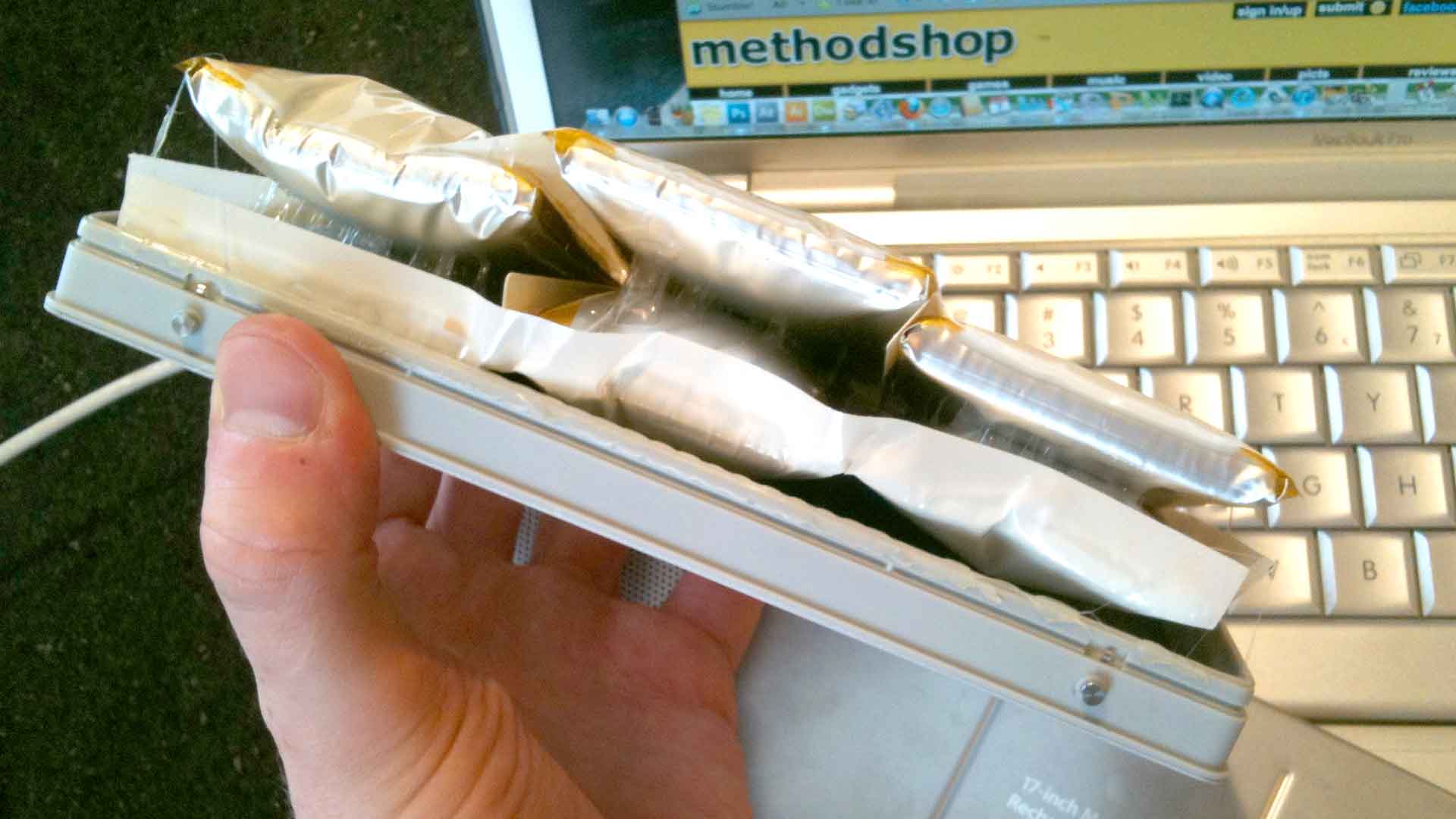 This MacBook Battery is Totally F*cked! Battery Removed Just Before It Explodes