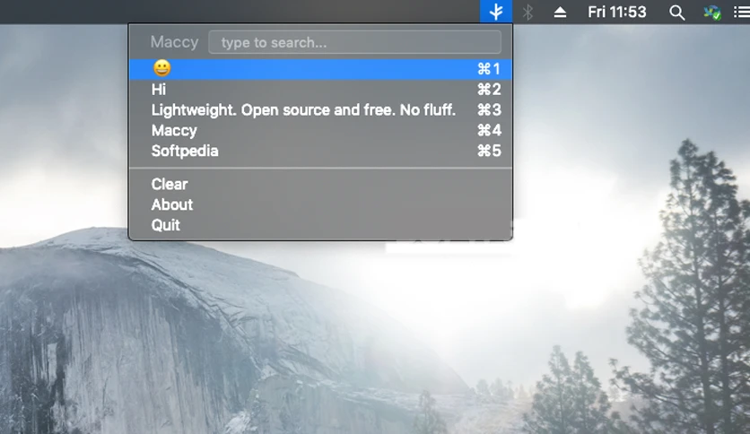 Screenshot Of A Computer Menu Featuring Options Like A Smiling Emoji, &Quot;Hi,&Quot; And &Quot;Lightweight. Open Source And Free. No Fluff.&Quot; Ideal For Clipmenu Users Seeking An Open-Source Clipboard Manager, It Highlights Maccy On A Softly Blurred Nature Background Alongside Softpedia.