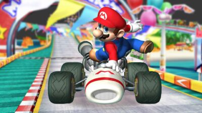 Mario riding a go kart in the video game Mario Kart