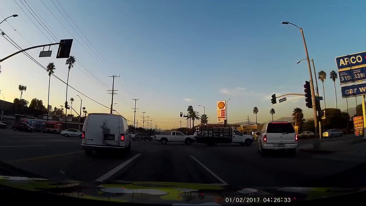 Driver Randomly Backs Up To Safety Seconds Before A Car Crash