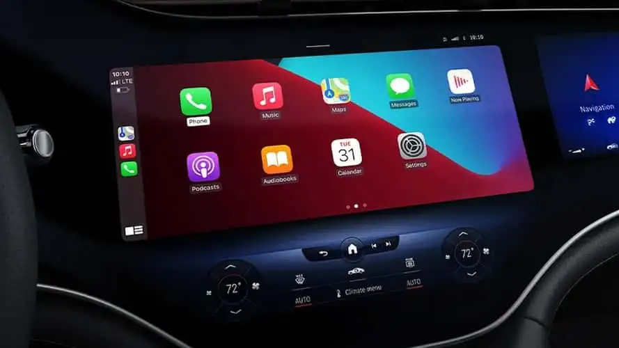 Mercedes Apple Carplay - Car'S Infotainment System Featuring Apple Carplay, Displaying Apps Like Phone, Messages, And Maps On A Touchscreen Interface, Set Above Climate Control Buttons.