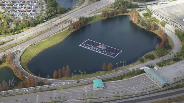 Nbc Comcast Uses A Floating Solar Farm To Display Their Corporate Branding On Lake At Its Universal Orlando Theme Park.