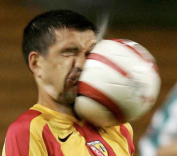 Soccer Player'S Face Vs Soccer Ball