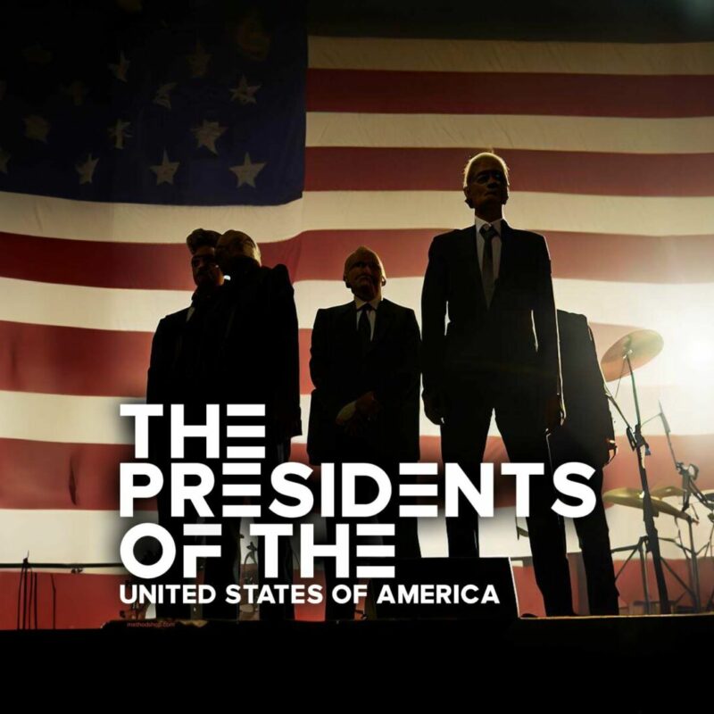 Ai Generated Image Of The Band The Presidents Of The United States Of America Standing On A Stage With An American Flag Behind Them