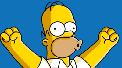 Homer Simpson Is Raising His Arms In The Air Because He Is Excited About The Simpsons Movie.