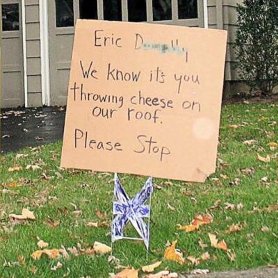 stop throwing cheese sign
