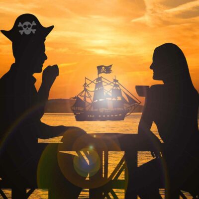 sunset couple pirate ship