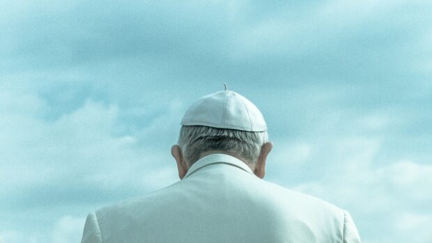 The Pope Wearing White Cap Looking Down Under Cloudy Sky During Daytime