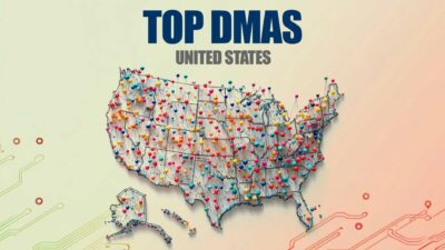 Top DMAs 2024 - A vibrant map of the United States showcases top Designated Market Areas (DMAs) with colorful pins in each region, including Alaska and Hawaii, providing a clear view of Nielsen DMA Rankings and the evolving media landscape.