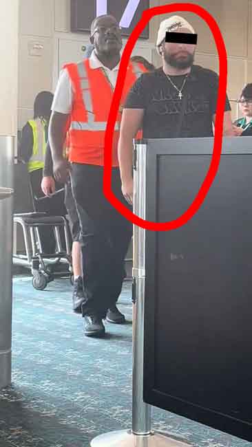 A Person In A Black Shirt And Hat Is Circled In Red, While An Airport Staff Member In An Orange Vest Stands Nearby. If You Want To Optimize Your Travel Experience, Consider The Pillowcase Travel Hack Instead Of Stop Listening To The Internet.